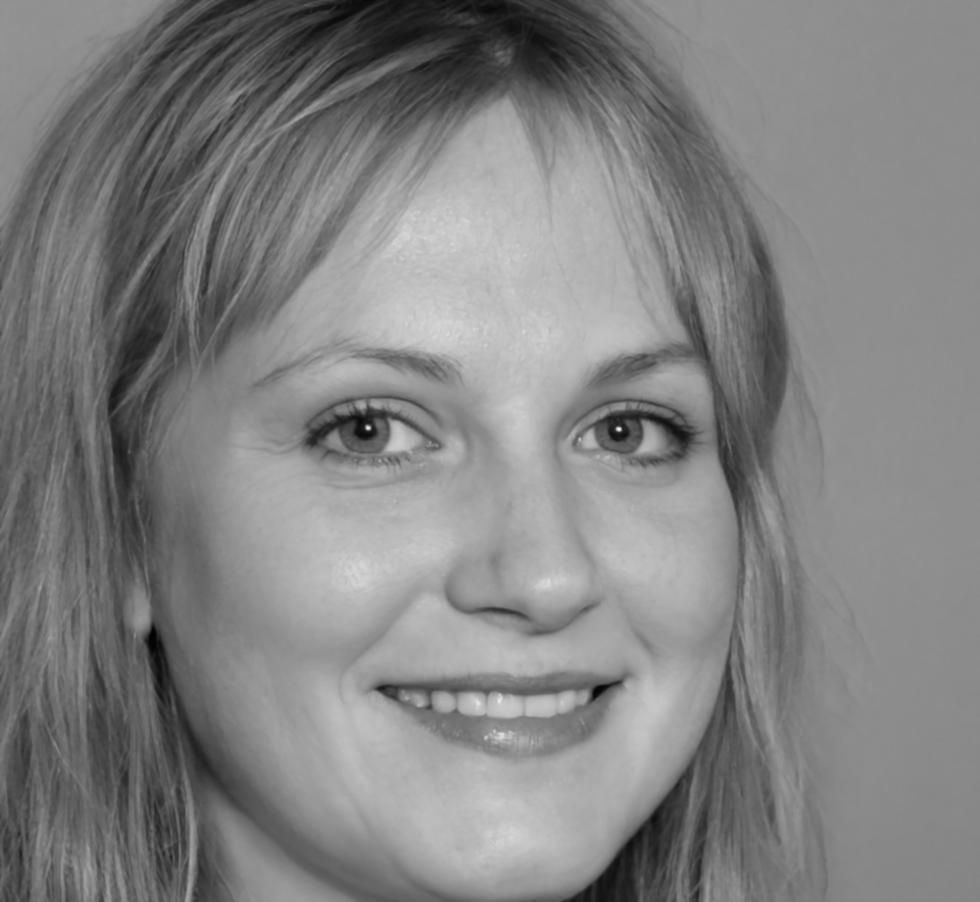 Portrait of Elena Santos, Senior Finance Analyst at Pacific Holdings
